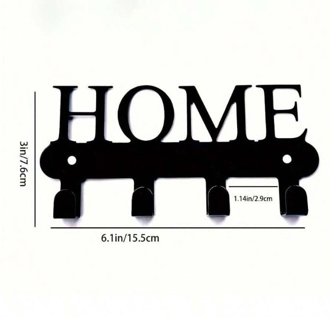Black 'HOME' text design wall mounted 4-hook key rack with measurements on a white background