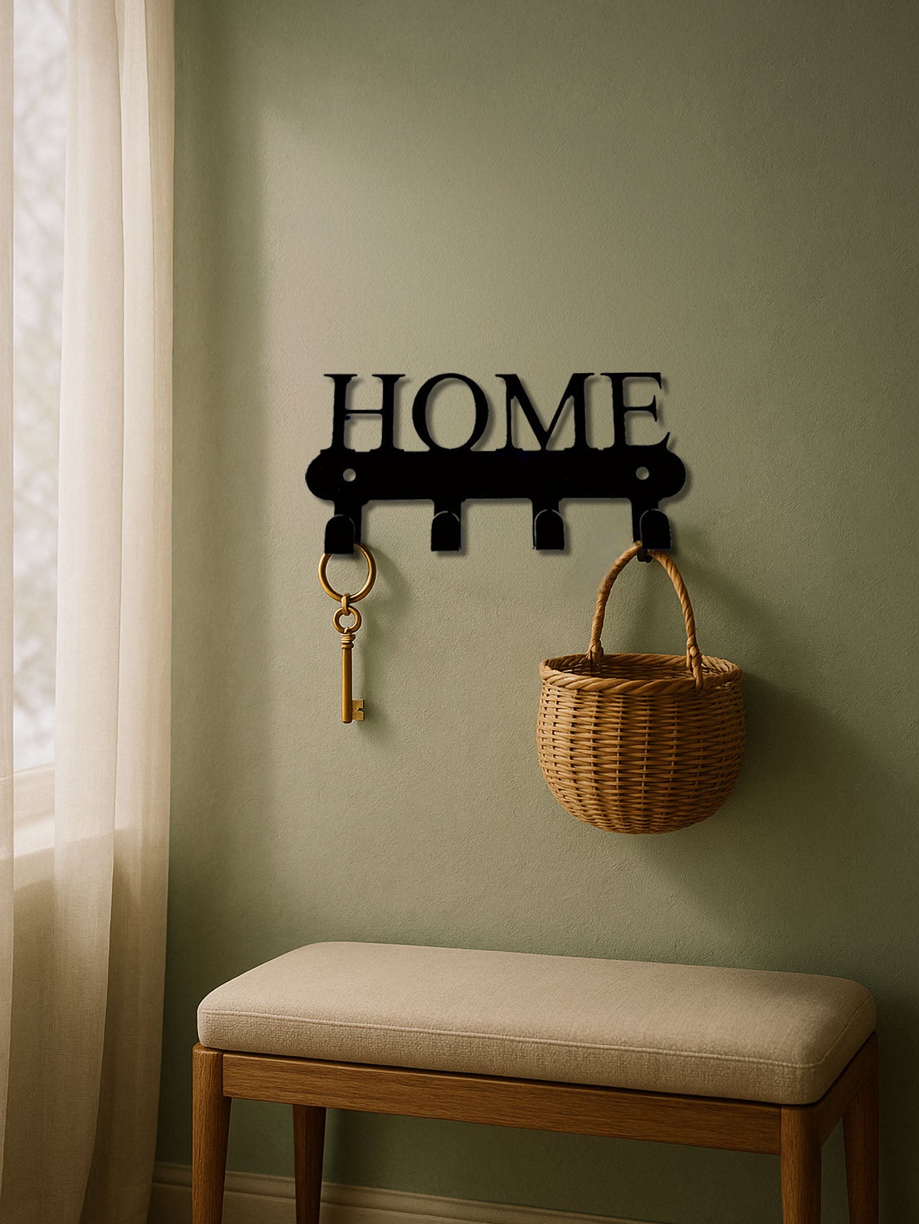 Decorative 4-hook wall mounted key and coat rack with 'HOME' letters on a green wall, next to a bench and basket.