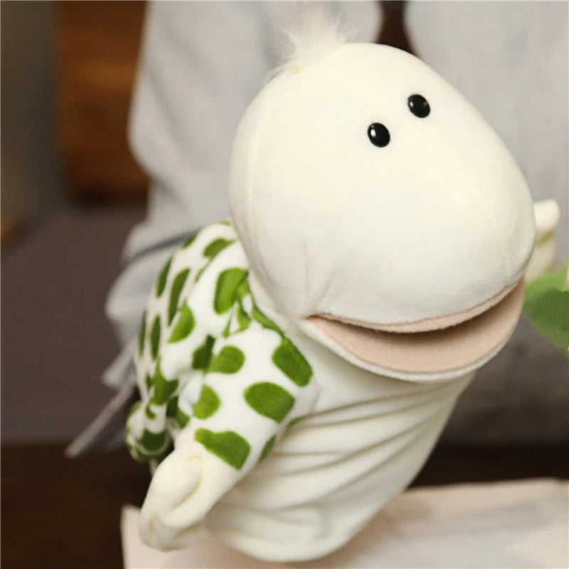 Plush rabbit hand puppet with green shell held by a person