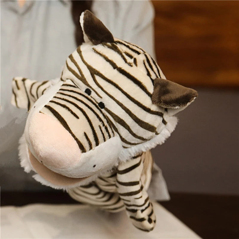 Plush zebra hand puppet on a neutral background