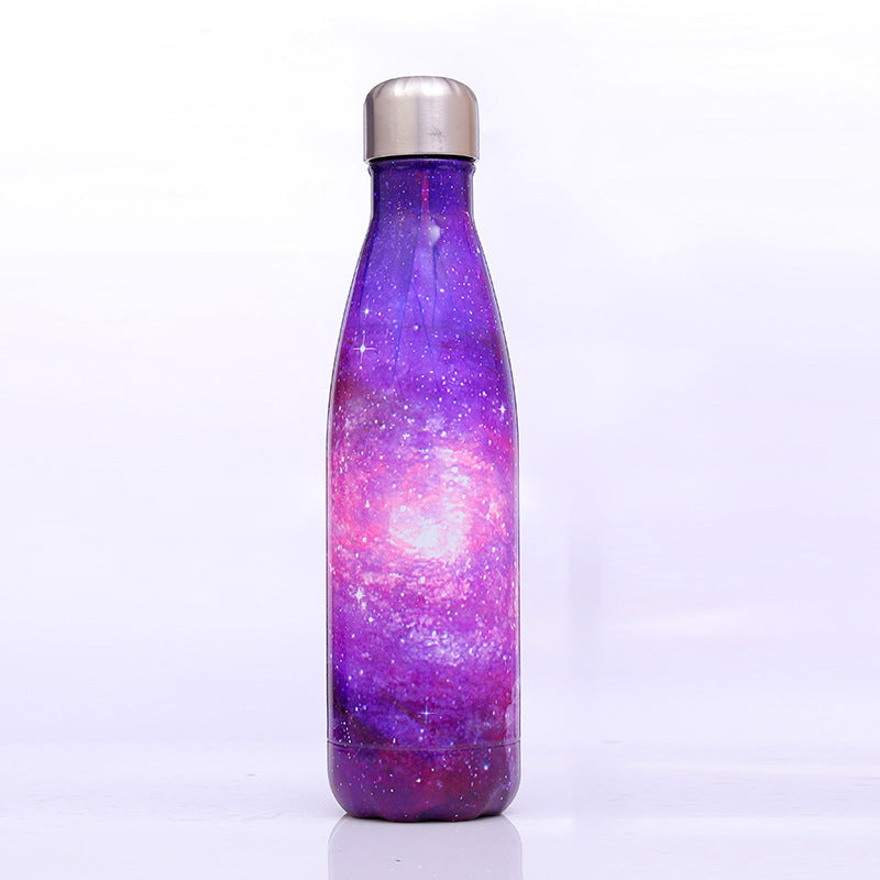 Image for stainless steel vacuum flask with sky galaxy style printing in purple color. The bottle has a stainless steel cap with a silicone sealing ring inside to keep it air tight when capped.