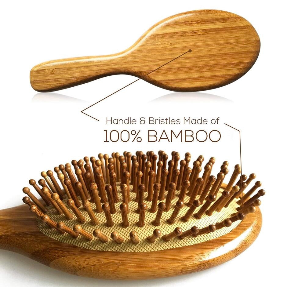 Image of bamboo wooden hair brush explaining the details of brush handle and bristles material. It is 100% wood.
