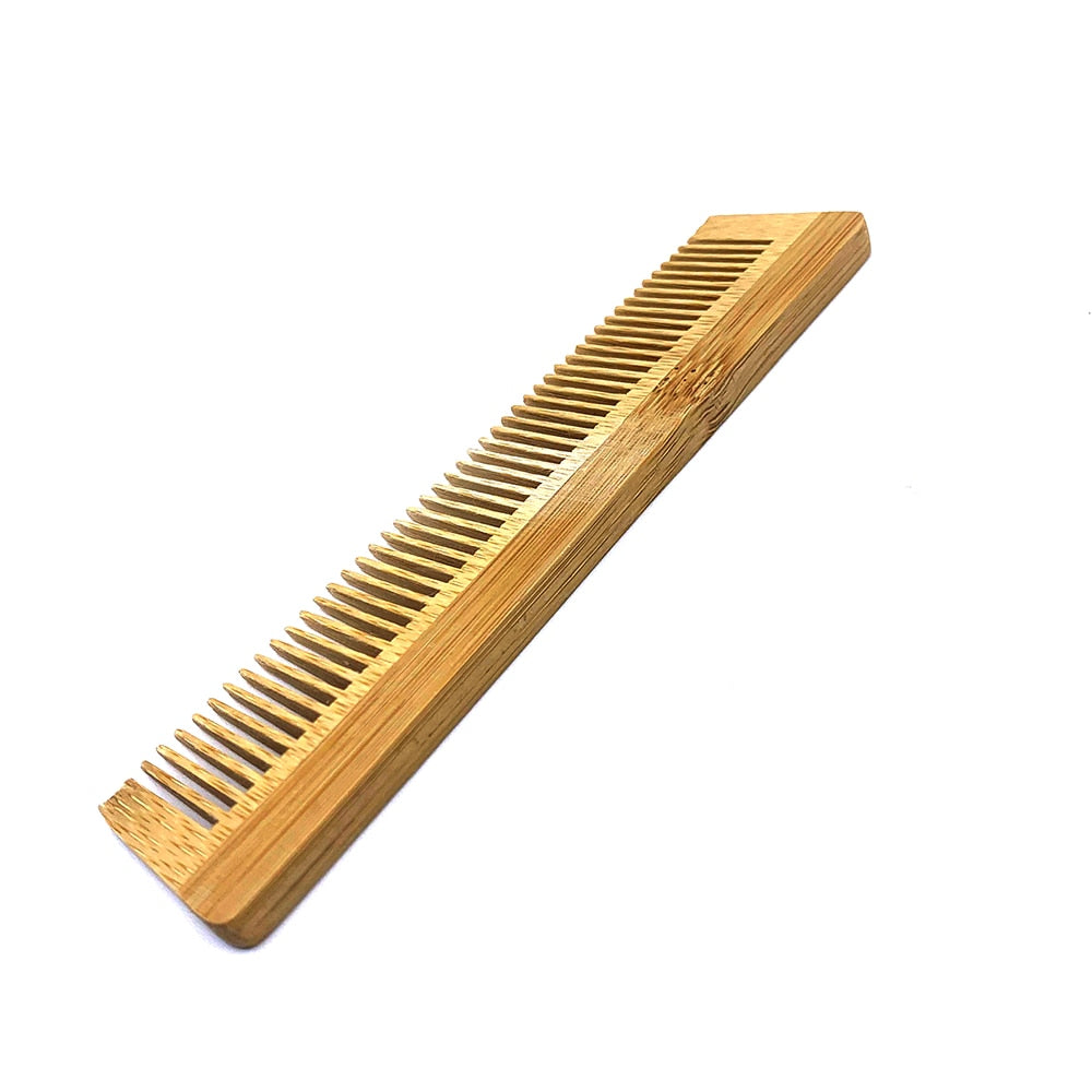 Image for a bamboo wood hair comb with wide and narrow tooth sides.