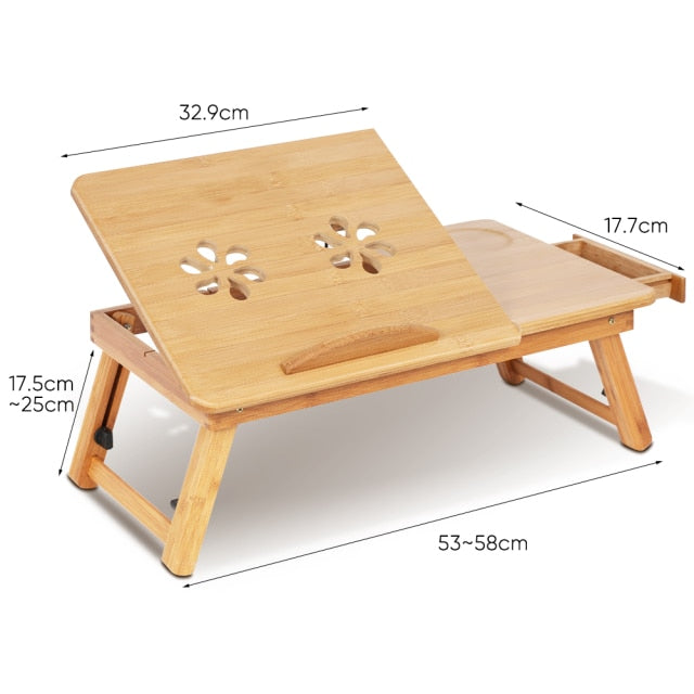 Image: Adjustable laptop stand dimensions (length range with expanded legs 53 to 58 cm, tilting panel width 32.9cm, legs height range 17.5 to 25cm, table top depth 17.7cm)