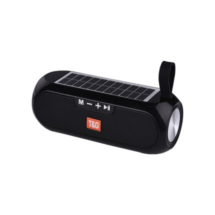 Image for solar powered waterproof outdoor speaker in black color. It has a silicon holding strap.