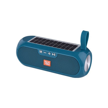 Image for solar powered waterproof outdoor bluetooth speaker in green color. It has a silicone strap for carrying it around.