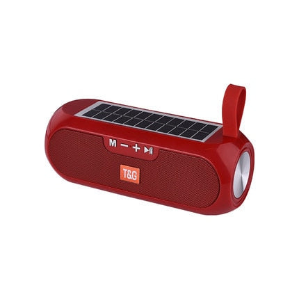 Image for solar powered waterproof outdoor bluetooth speaker in red color. It has a silicone strap for carrying it around.