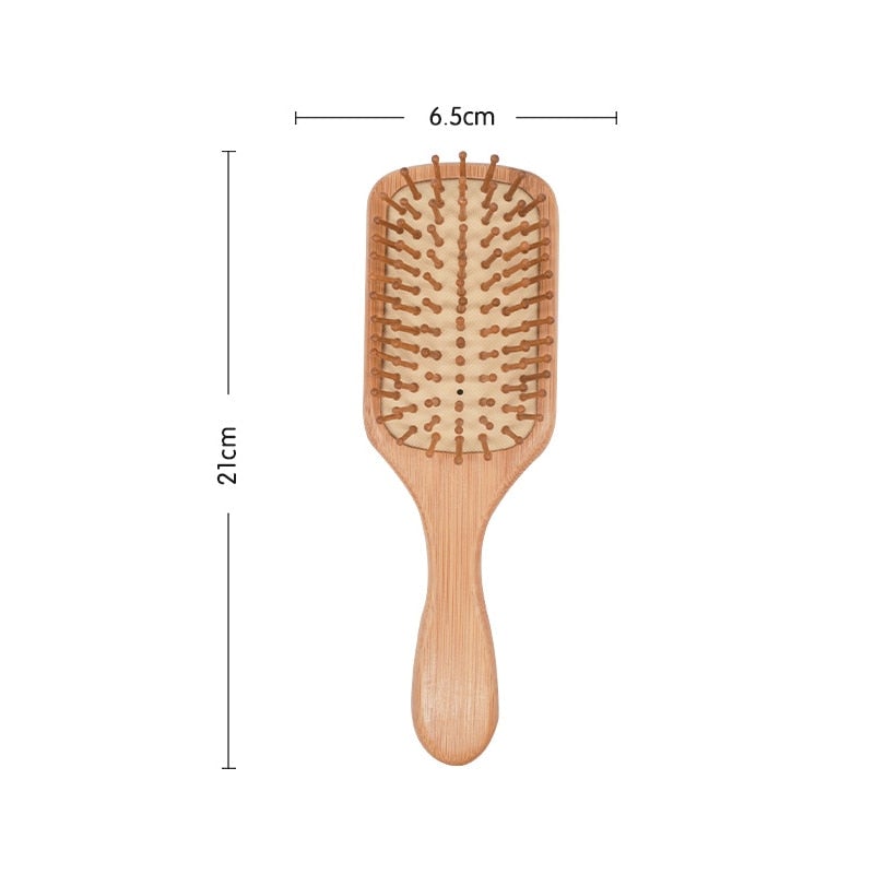 Image of square head bamboo wooden hair brush with marked dimensions as 21cm full brush length and 6.5cm wide brush head.