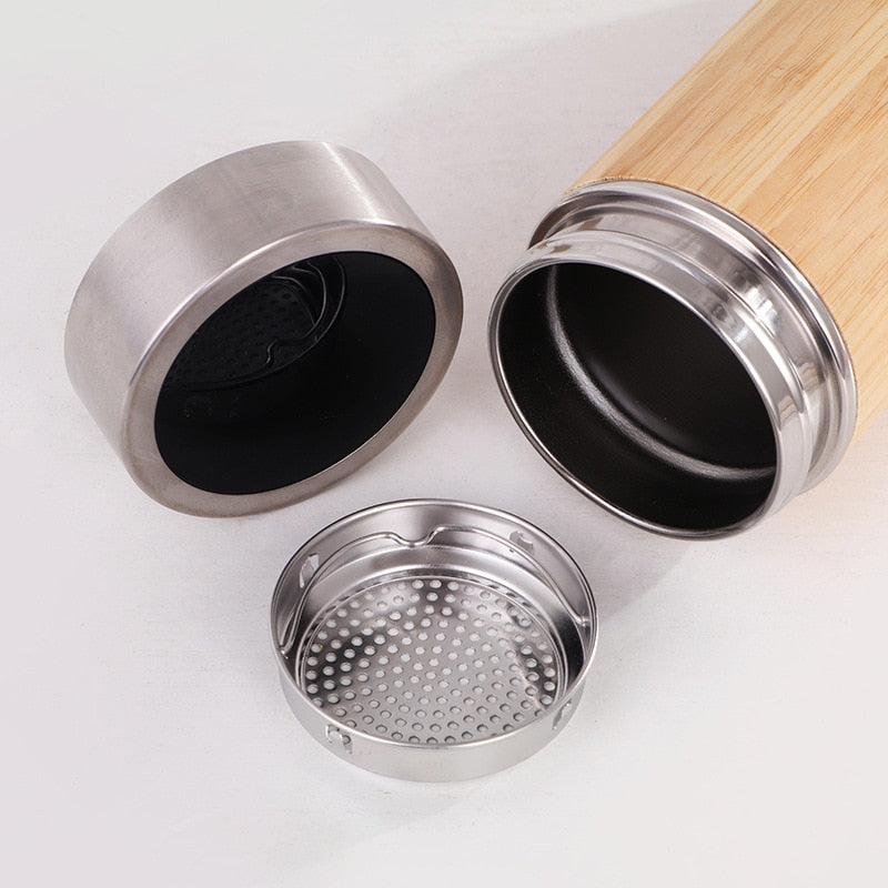 Image for stainless steel thermos flask with lid and filter removed. The lid and removable filter are placed next to it.