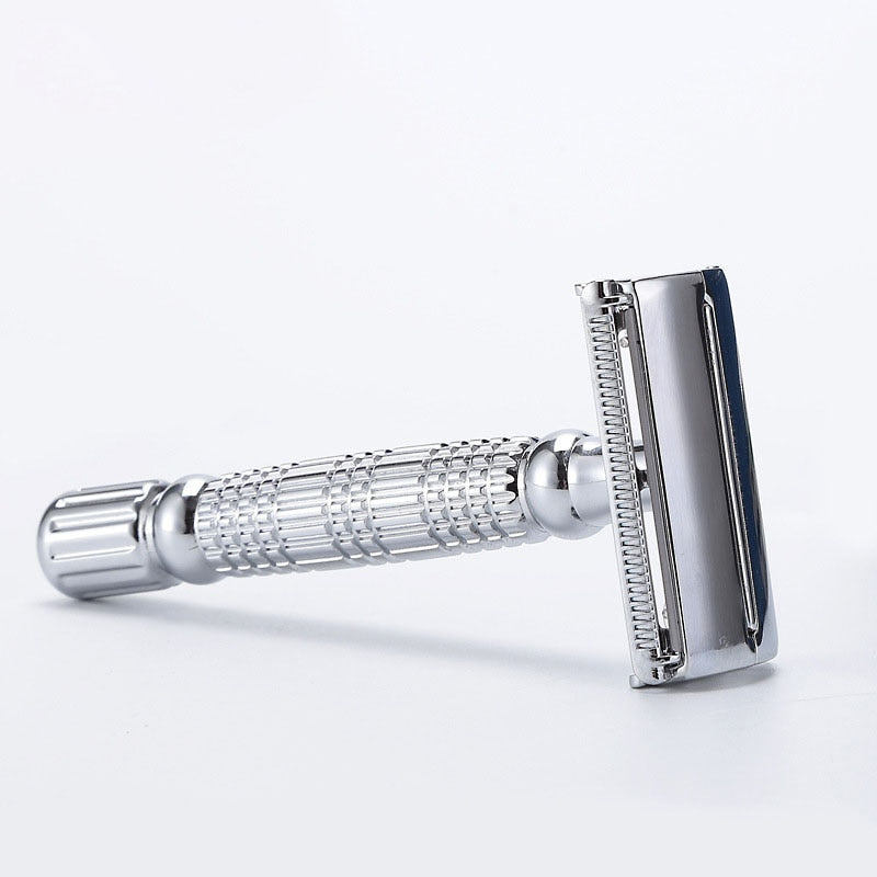 Image for reusable stainless steel safety razor for men placed with the blade holder head in vertical posture.