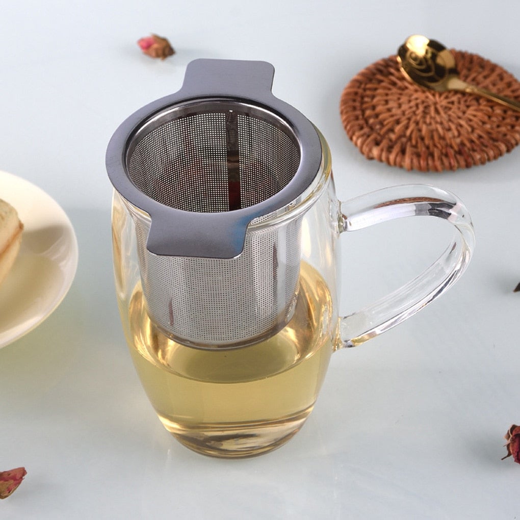 Image for stainless steel loose leaf tea infuser placed on a tea cup.